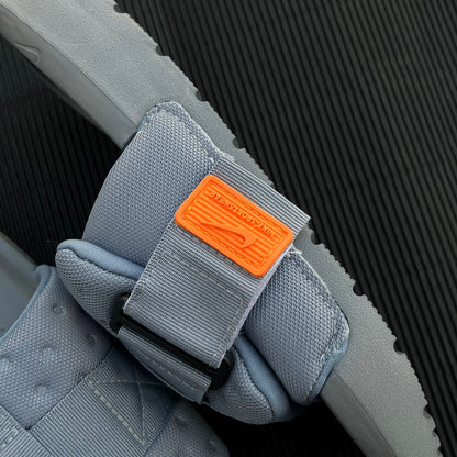 NIK-ASNA-SLIDES-GREY